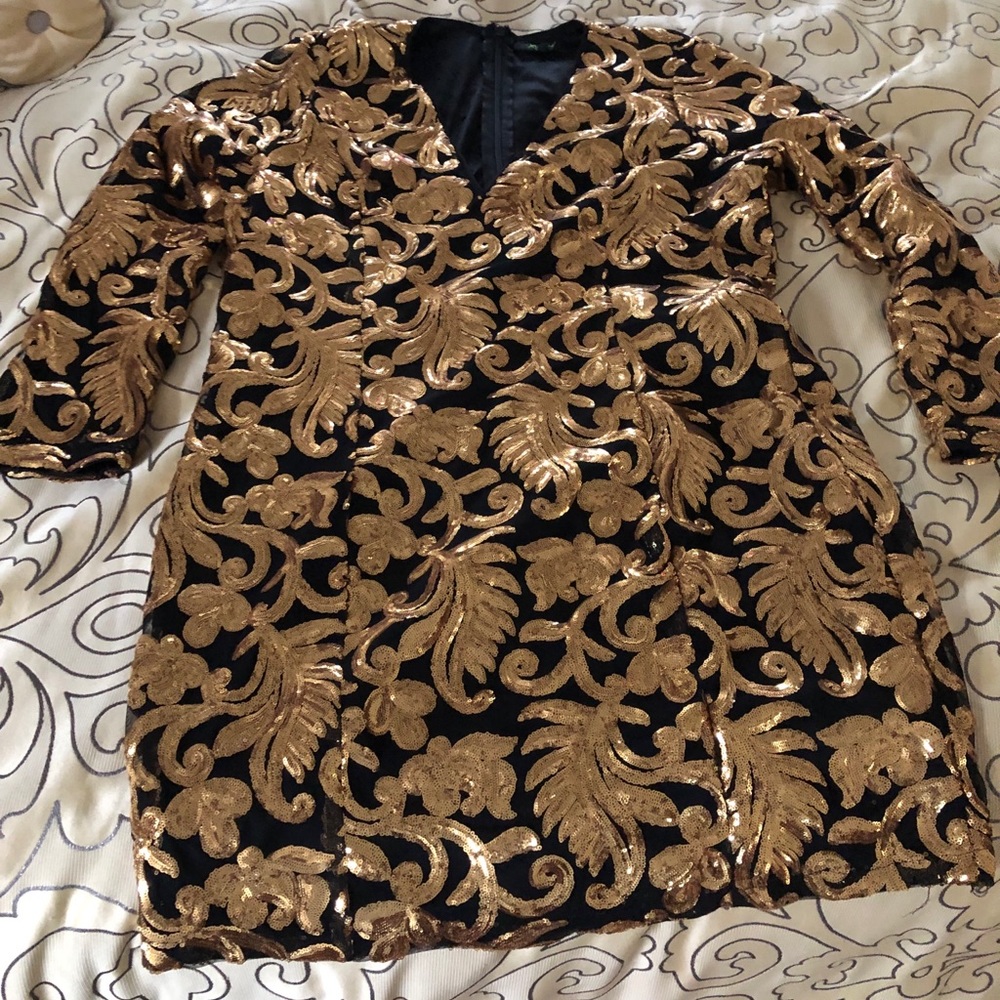 Gold and black sequin dress
